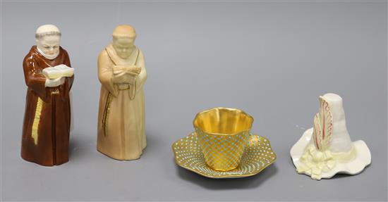 Three Royal Worcester candle extinguishers and a Coalport cabinet jewelled coffee cup and saucer tallest 12cm